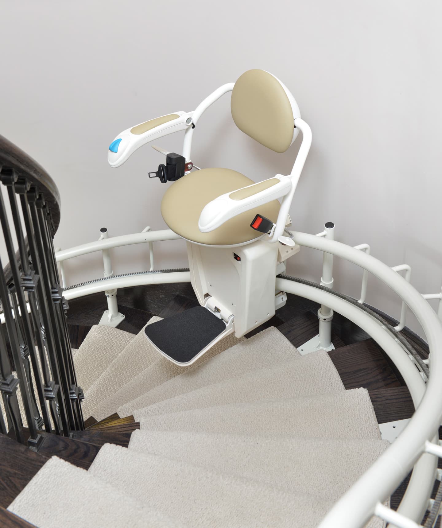 Stairfriend stairlift on curved staircase showing V seat option